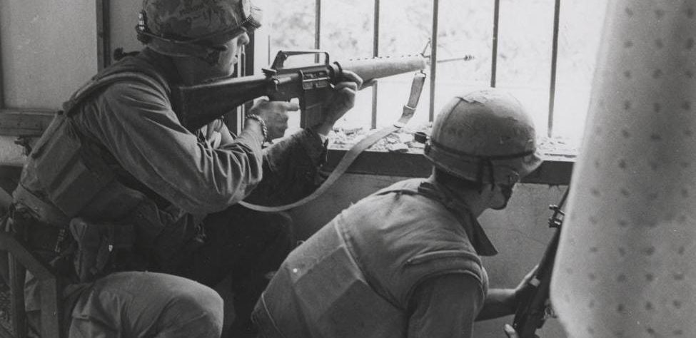 Marines_Fire_From_a_House_Window,_February_1968_(16242259837)_(cropped)