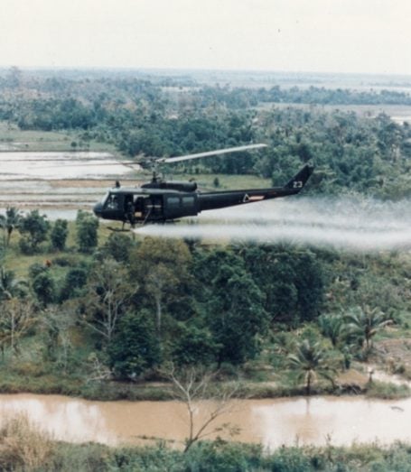 us-huey-helicopter-spraying-agent-orange-in-vietnam